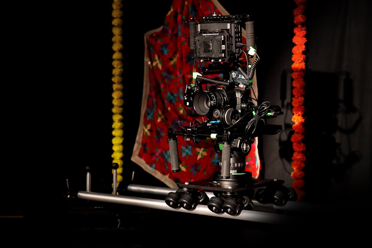 A professional camera rig setup in a vibrant studio space with colorful decorations.